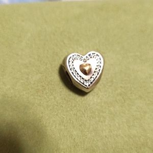 Pandora charm heart.